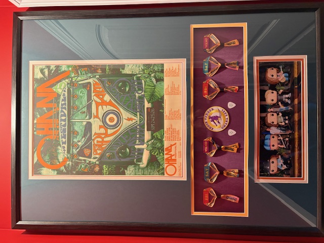 Ohana Festival 2021 shadowbox with poster, wristbands, guitar picks, and photograph