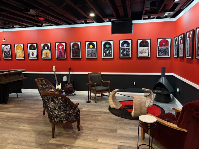 The chronological album wall at The Ryan Lewis Collection
