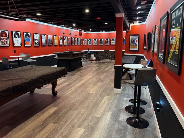 The Great Hall with pool table and continued album wall