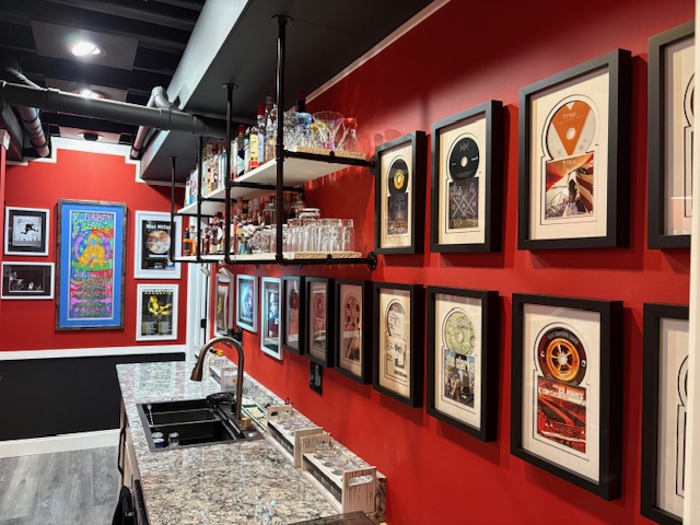The L7067 Bar with framed signed CDs on the wall