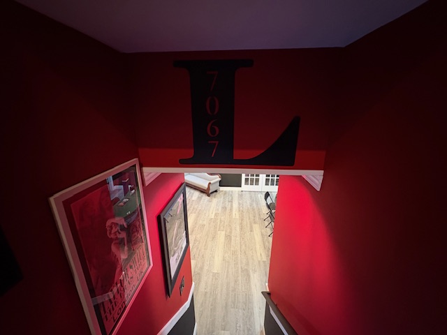 Stairway descent into L7067 with Pearl Jam posters